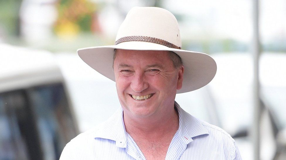 Australian former Deputy Prime Minister Barnaby Joyce hands out "how-to-vote" cards at a pre-poll in Glen Innes in the New England electorate, New South Wales, Australia, 29 November 2017