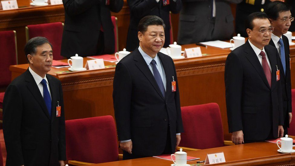China's President Xi Jinping in the centre, Premier Li Keqiang second right, Chairman of the National Committee of the Chinese People's Political Consultative Conference Wang Yang left and Politburo Standing Committee member Wang Huning on the right