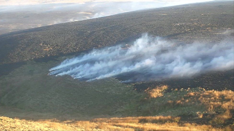 Heather burning on Walshaw Moor, Calderdale