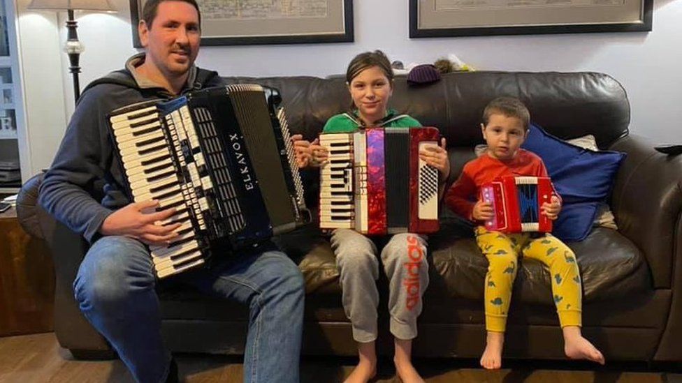Family with accordions