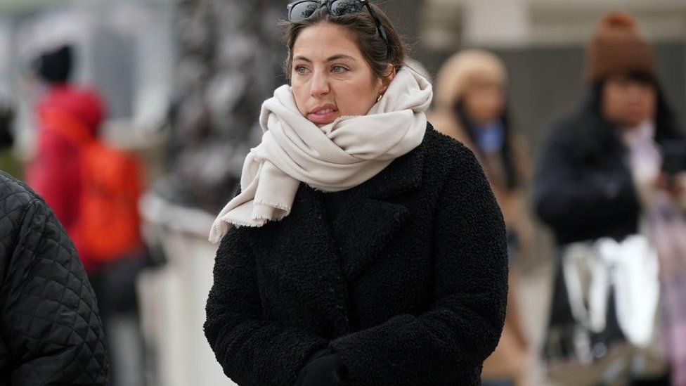 This Londoner looks deeply unimpressed with the chilly weather