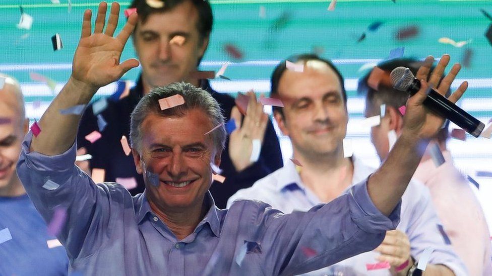 Argentine President Mauricio Macri greets supporters at the Cambiemos headquarters, in Buenos Aires