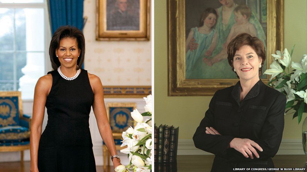 Former first lady Michelle Obama (L) and former first lady Laura Bush (R)