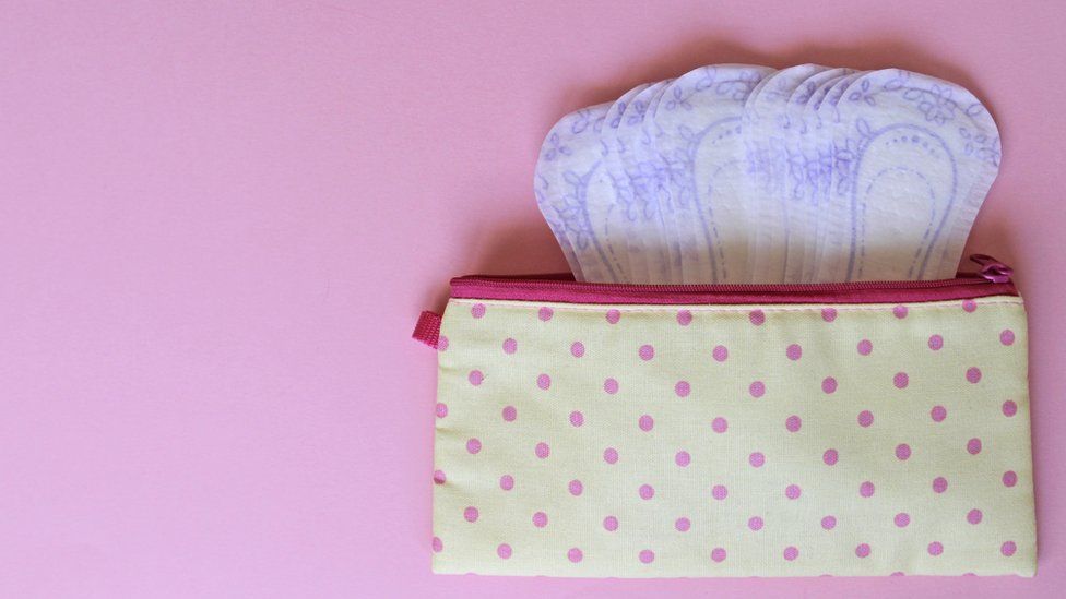sanitary products in a purse