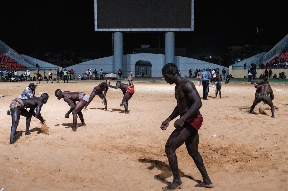 Competitive wrestlers at an arena in Dakar, Senegal - Sunday 5 February 2023