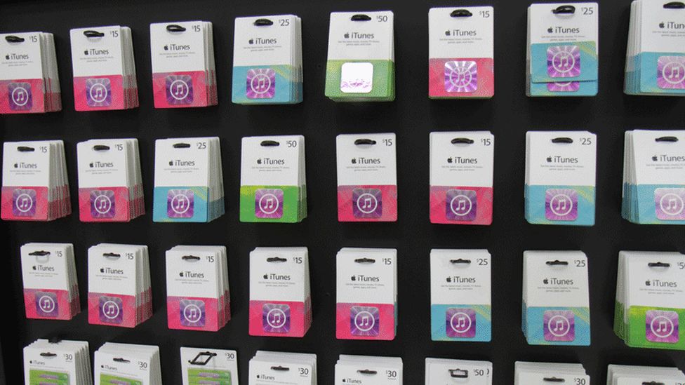 iTunes gift cards on display in Walmart