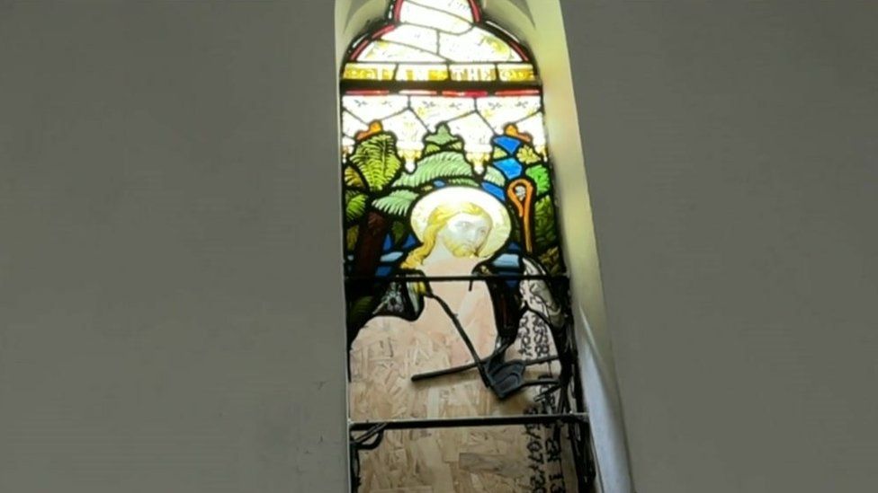 Smashed stained glass window
