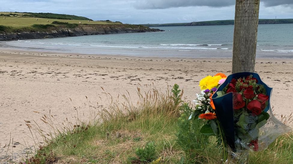 Floral tributes were left at West Angle Bay