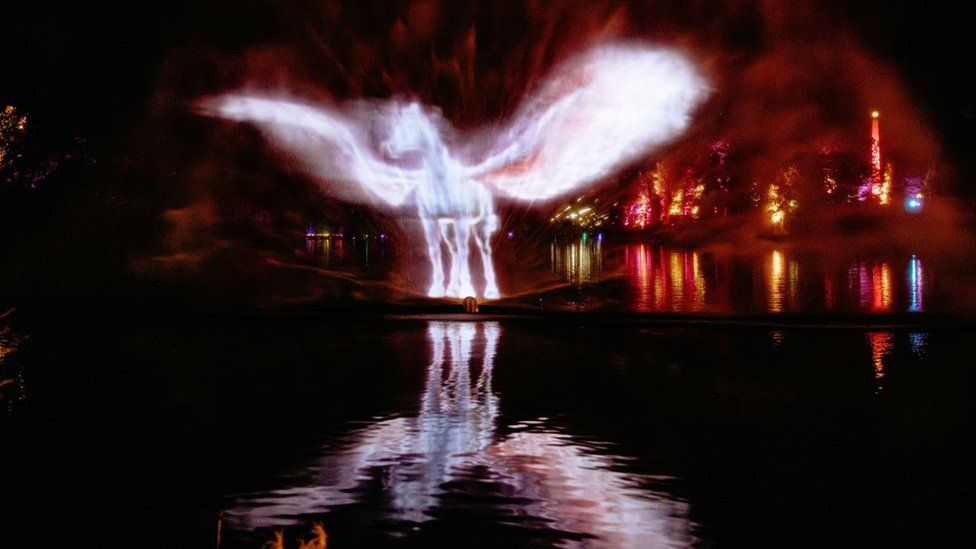 Pegasus projection lit up white against the night sky
