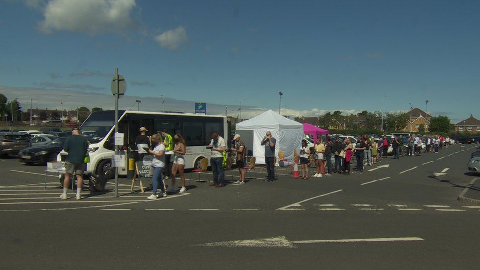 People queue for vaccine in Bangor