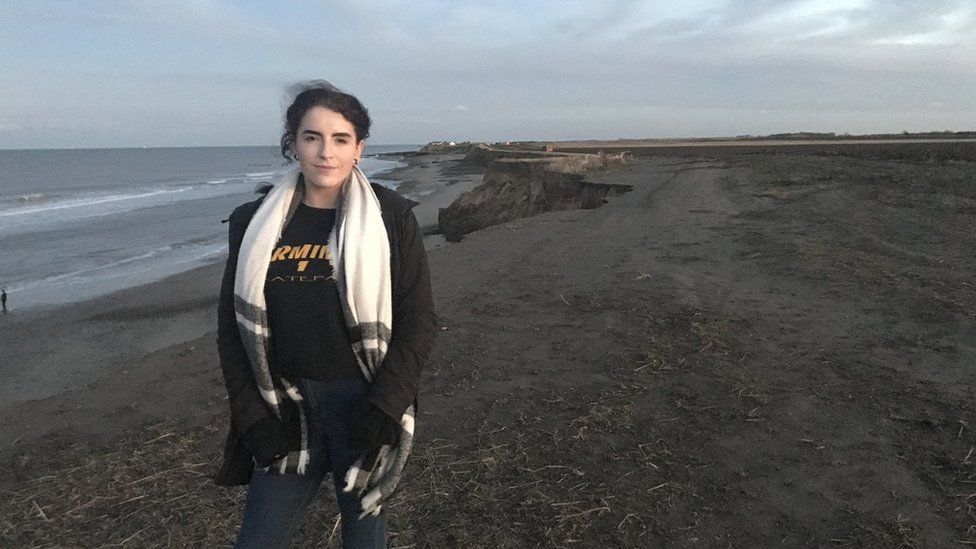 15-year-old Darcy standing on the cliff near her home
