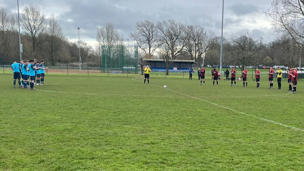 Cumbria football games paused in memory of team captain - BBC News