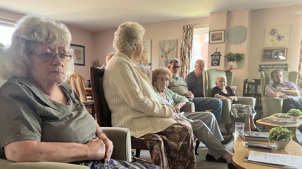 Residents sitting in the Ivy House retirement home