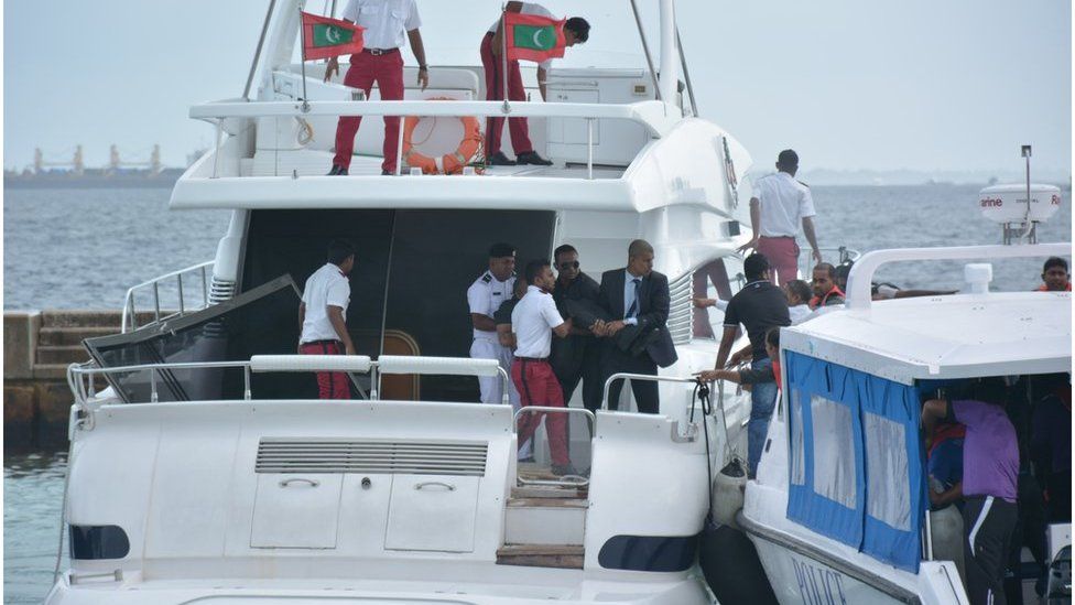 Unidentified injured people are evacuated after a blast on the Maldives President Yameen Abdul Gayoom speedboat in Male, Maldives Monday, 28 Sept 2015
