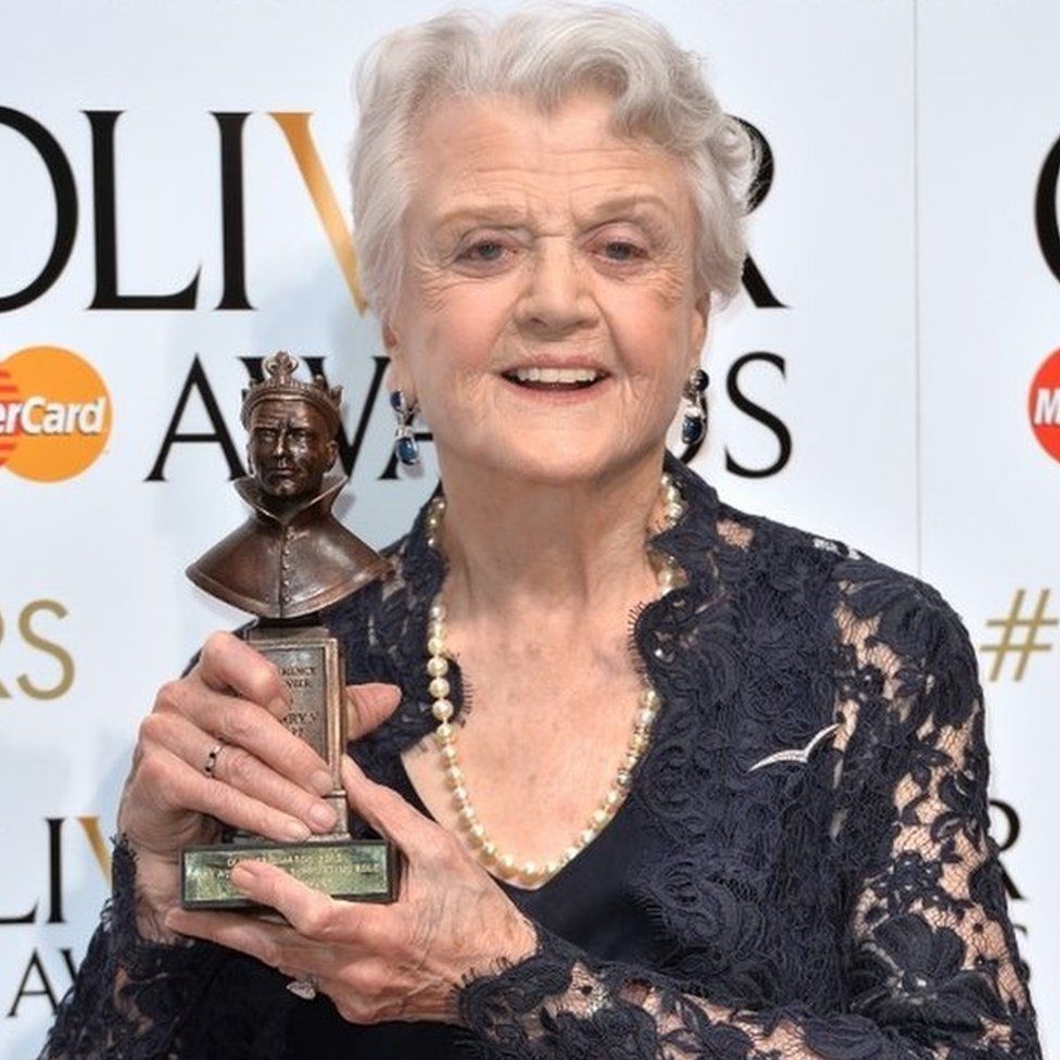 Angela Lansbury holding her Olivier award in 2015