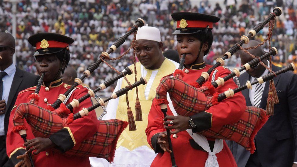 Bagpipe players perform after Gambian President Adama Barrow (C) has taken the oath during his inauguration ceremony in a Banjul stadium, The Gambia - Saturday 18 February 2017