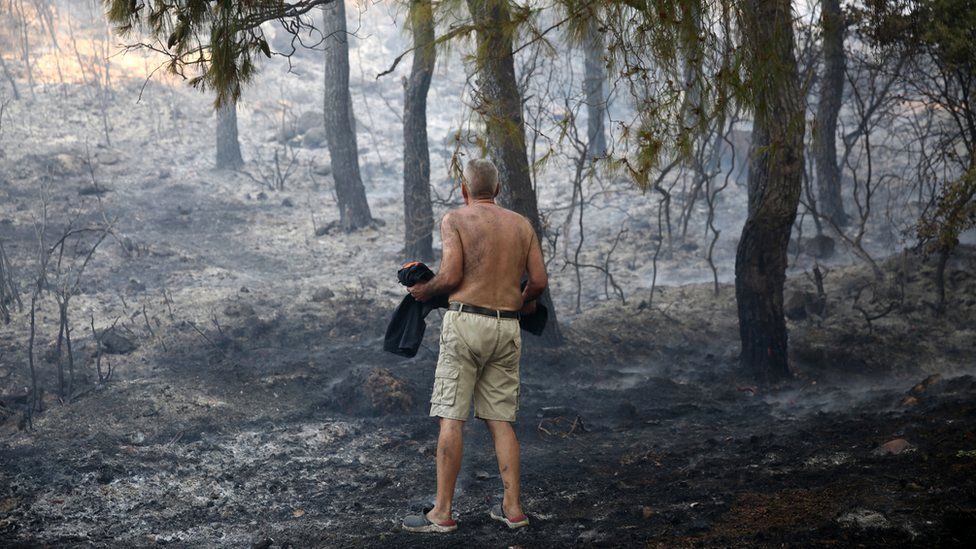 Greece wildfires spread, causing mass evacuations - BBC News