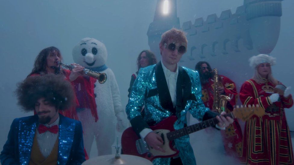 A screenshot of the music video for Merry Christmas by Ed Sheeran and Elton John