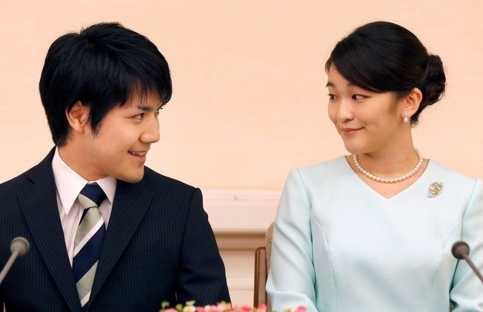 Princess Mako, the elder daughter of Prince Akishino and Princess Kiko, and her fiancee Kei Komuro, a university friend of Princess Mako, smile during a press conference to announce their engagement at Akasaka East Residence in Tokyo, Japan, September 3, 2017.