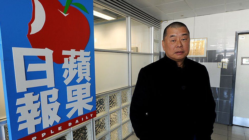 This photo taken on February 7, 2011 shows Hong Kong media tycoon Jimmy Lai outside his company's headquarters in Hong Kong. Lai,