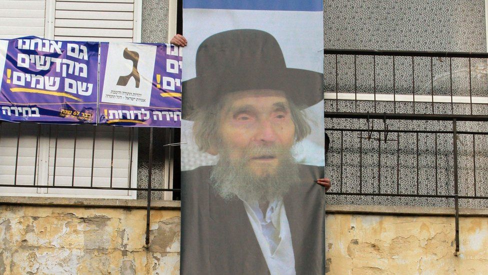 File photo shows banner bearing a picture of Rabbi Aharon Shteinman at an election rally in Bnei Brak, Israel (11 March 2015)