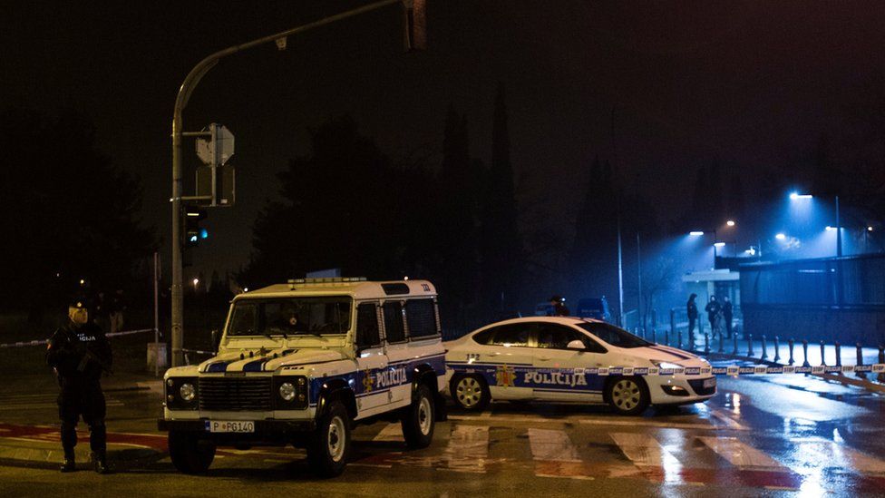 Police cars outside the embassy