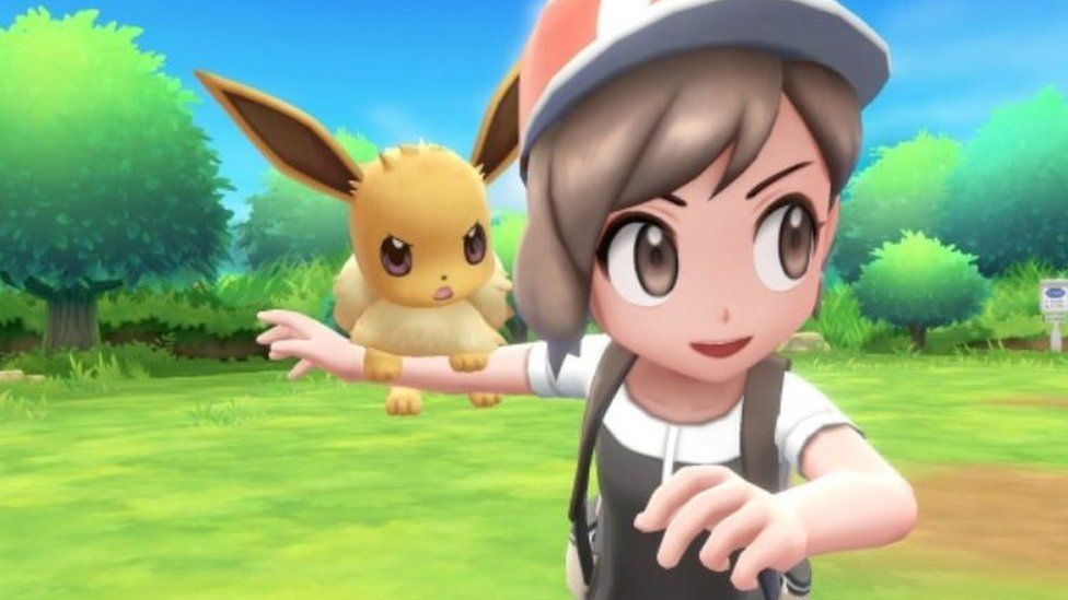 Eevee on shoulder of Pokemon trainer