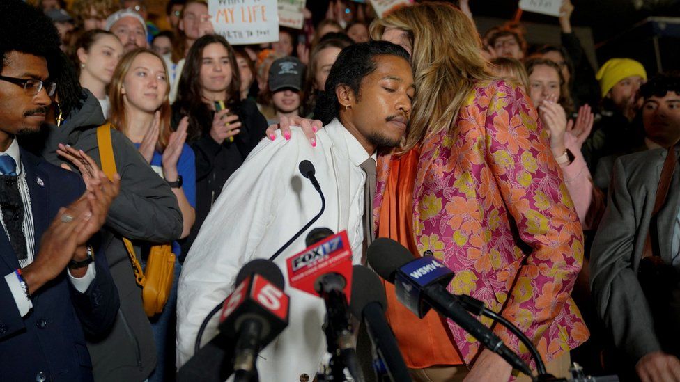 Justin Jones embraces Rep. Gloria Johnson during a media conference after a vote on to expel two of three Democratic members for their role in a gun control demonstration at the statehouse last week, in Nashville, Tennessee