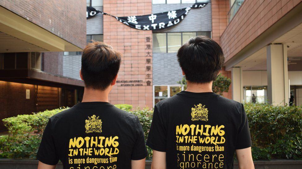 Back profile of two HKU students who took part in the protests