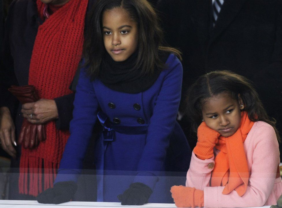 Malia and Saha looking bored at Obama's swearing in ceremony