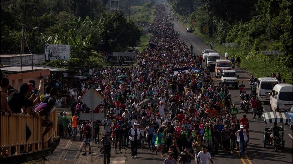 A migrant caravan from Central America proceeds towards Tapachula from Ciudad Hidalgo, after crossing the Guatemala border into Mexico, while en route to the United States on October 21, 2018