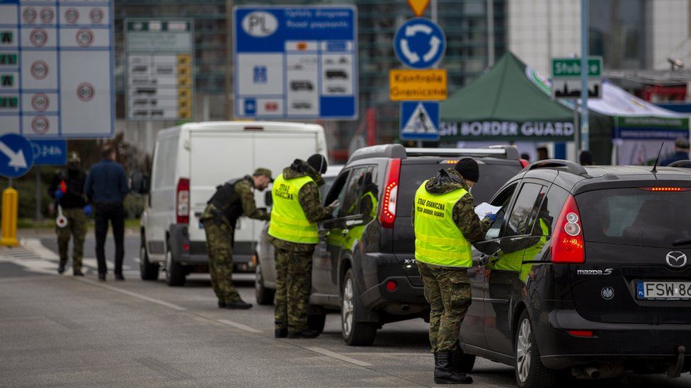 Border control guards stop cars before crossing German/Polish border at Slubice/Frankfurt (Oder) on March 20, 2020