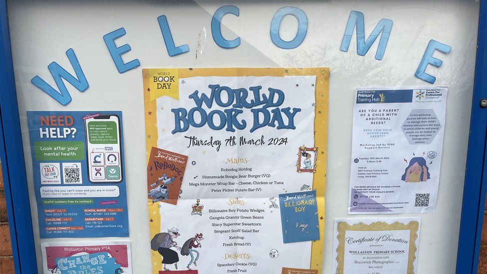 Posters on a school noticeboard advertising World Book Day