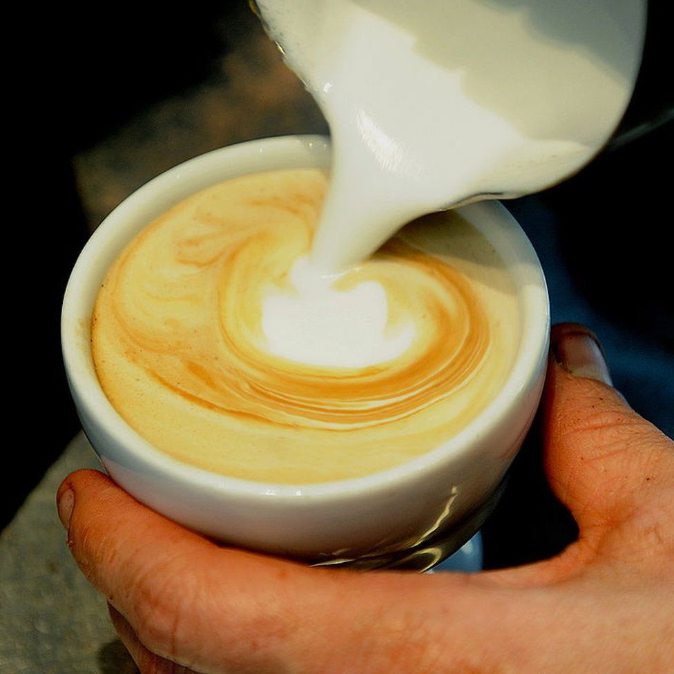 A flat white poured at a Sydney cafe