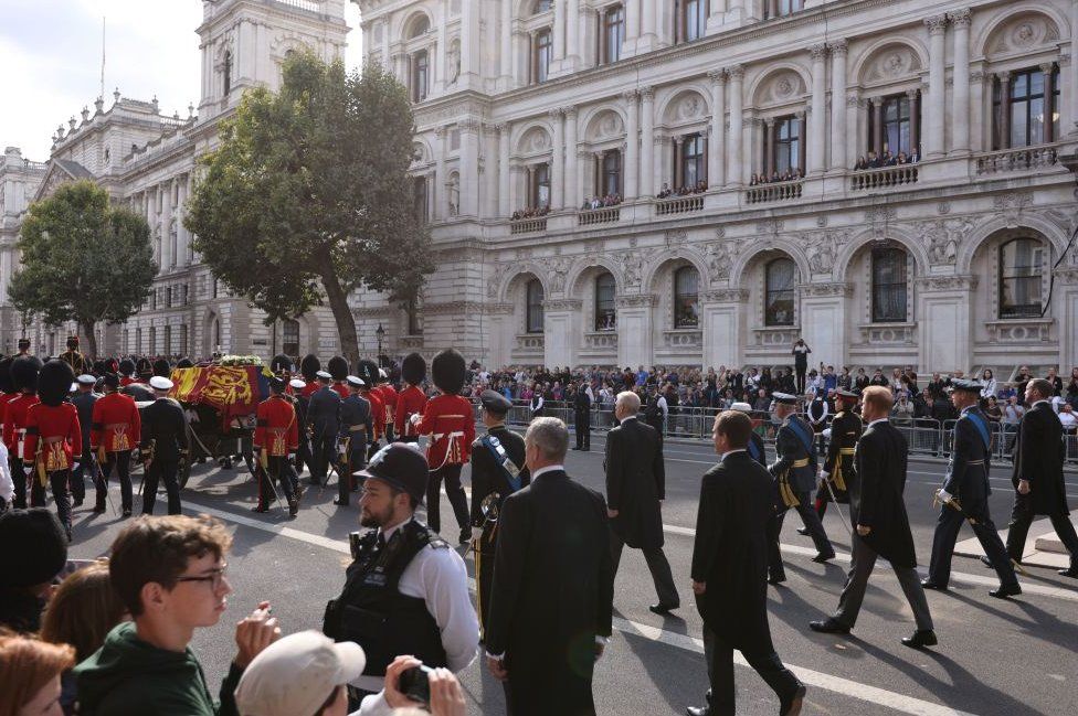 The ceremonial procession of the coffin of Queen Elizabeth II from Buckingham Palace to Westminster Hall
