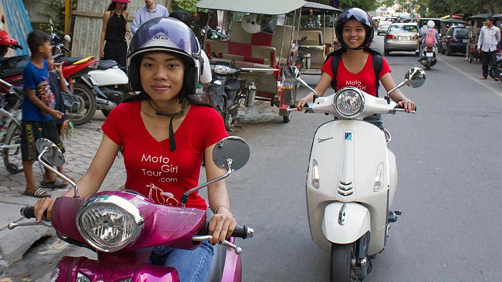 Phnom Penh's No 1 ladies taxi scooter agency - BBC News