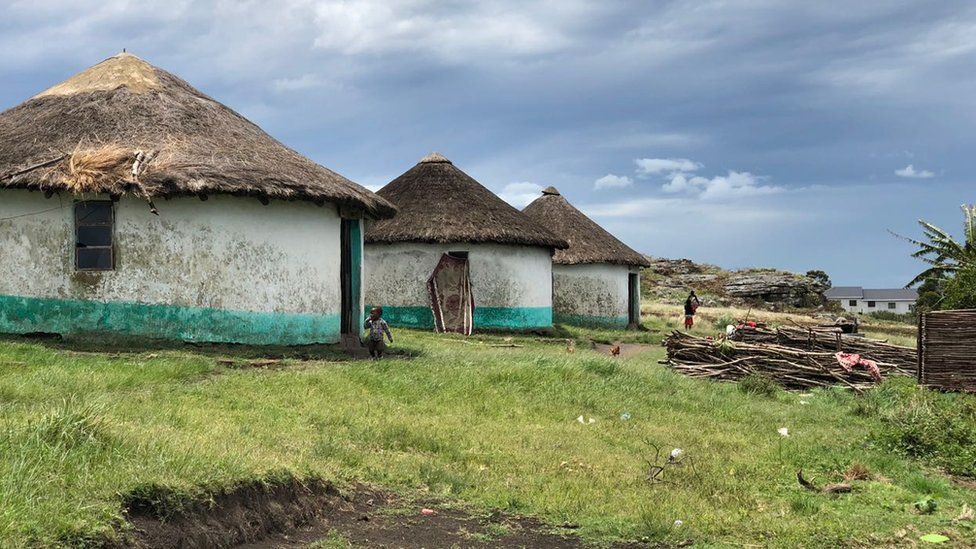 A row of mud huts in Xolobeni, Eastern Cape