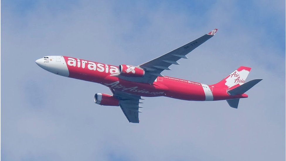 AirAsia plane flying in Malaysia