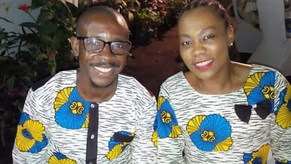 Jean-Félix Mwema Ngandu and Arlene Agneroh sit side by side in matching outfits in this photo taken by a mutual friend who uploaded it to Facebook