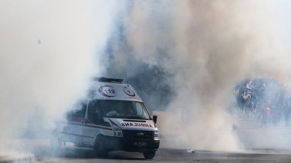 An ambulance driving through tear gas in Ankara after explosions, Turkey, Saturday 10 October 2015