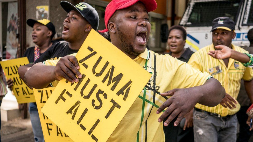 Supporters of ANC president Cyril Ramaphosa chant slogans outside party headquarter in Johannesburg, on February 5, 2018