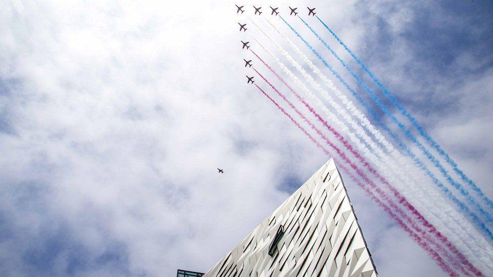 The Red Arrows pass over The Titanic Quarter in Belfast