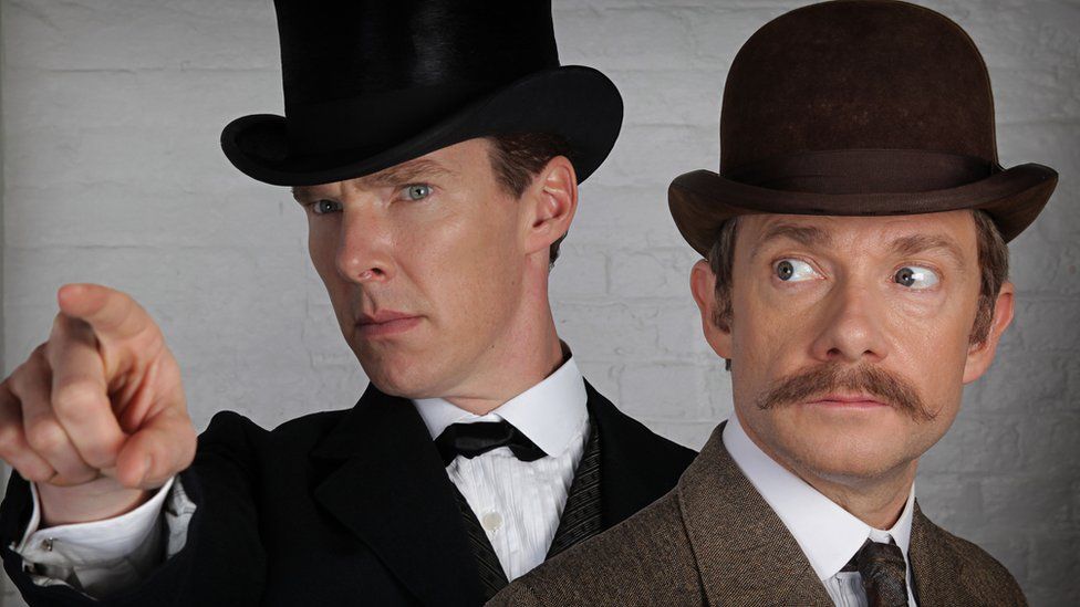Benedict Cumberbatch and Martin Freeman as Sherlock and Watson dressed in Victorian garb