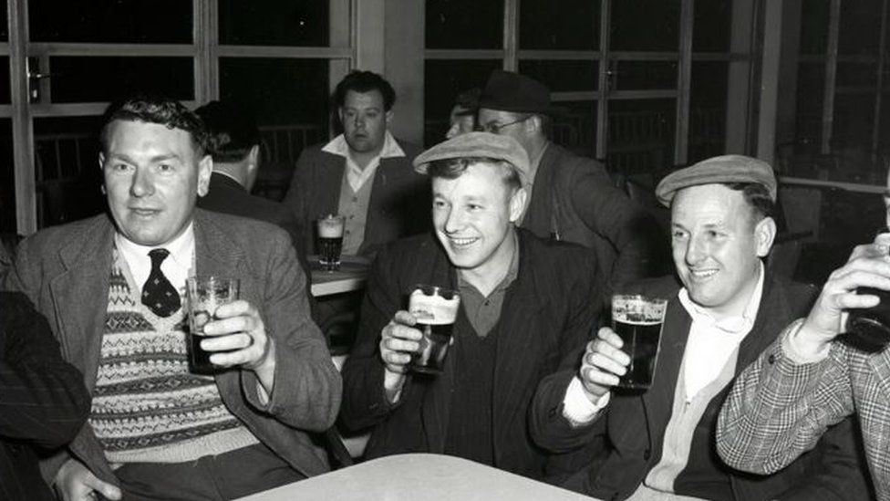 Steelworkers enjoying a drink at the SCOW social club