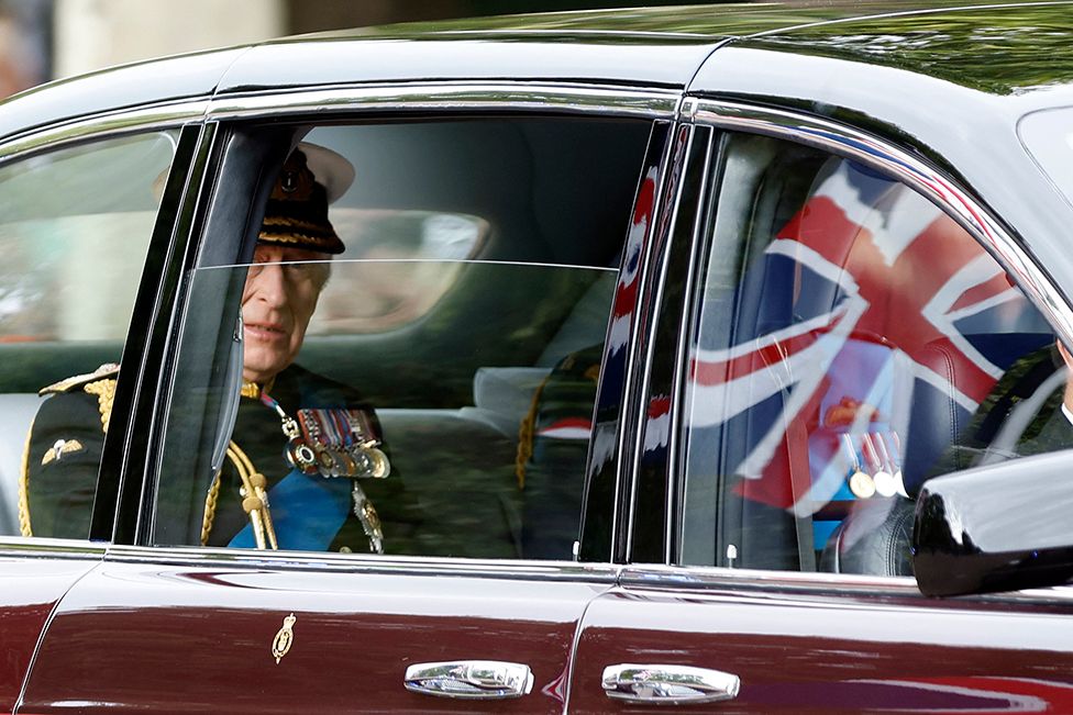 Britain's King Charles is seen travelling in a car on The Mall, on the day of the state funeral and burial of Britain's Queen Elizabeth, in London, Britain, 19 September 2022