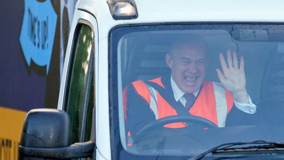 Ed Davey in a removal van