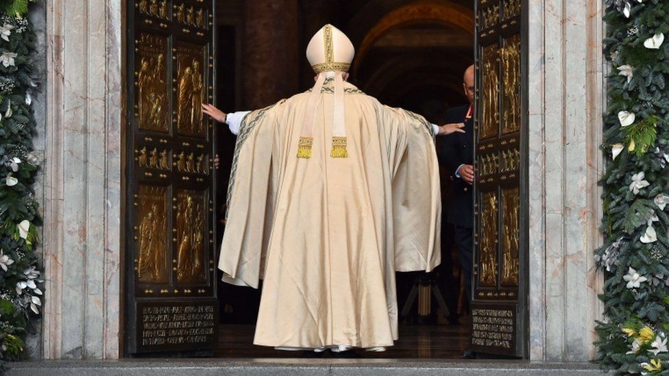 Pope Francis opens the Holy Door of St Peter's Basilica