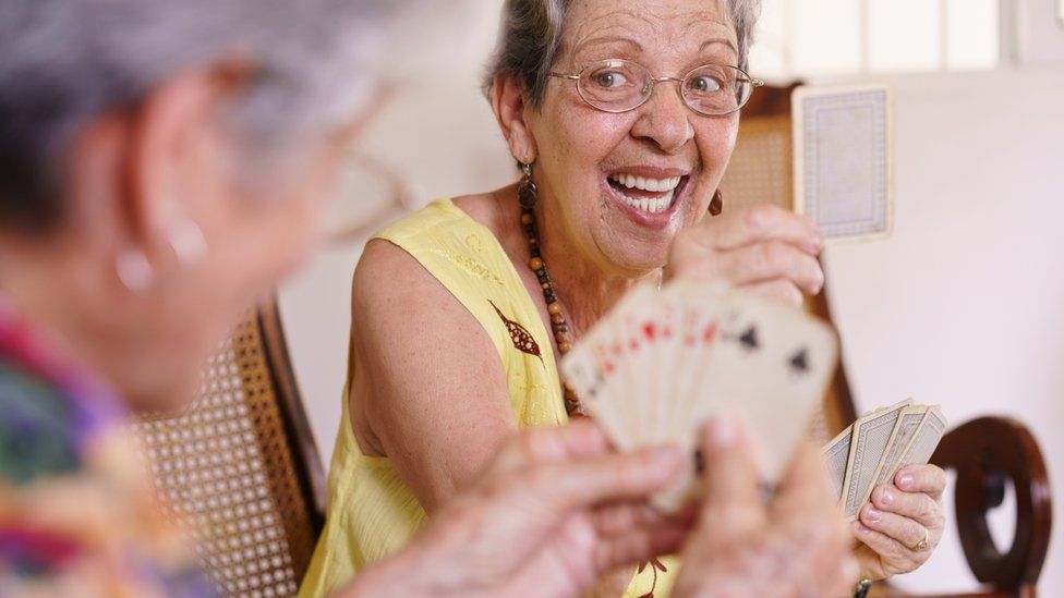 women playing cards