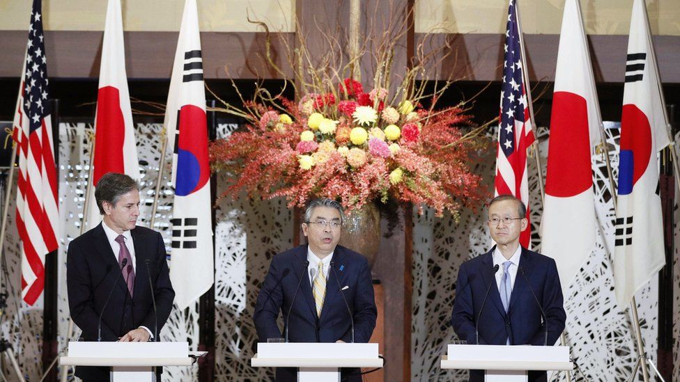 US Deputy Secretary of State Antony Blinken, left, Japanese and South Korean counterparts Shinsuke Sugiyama and Lim Sung-Nam, at a joint press conference in Tokyo, 27 October.