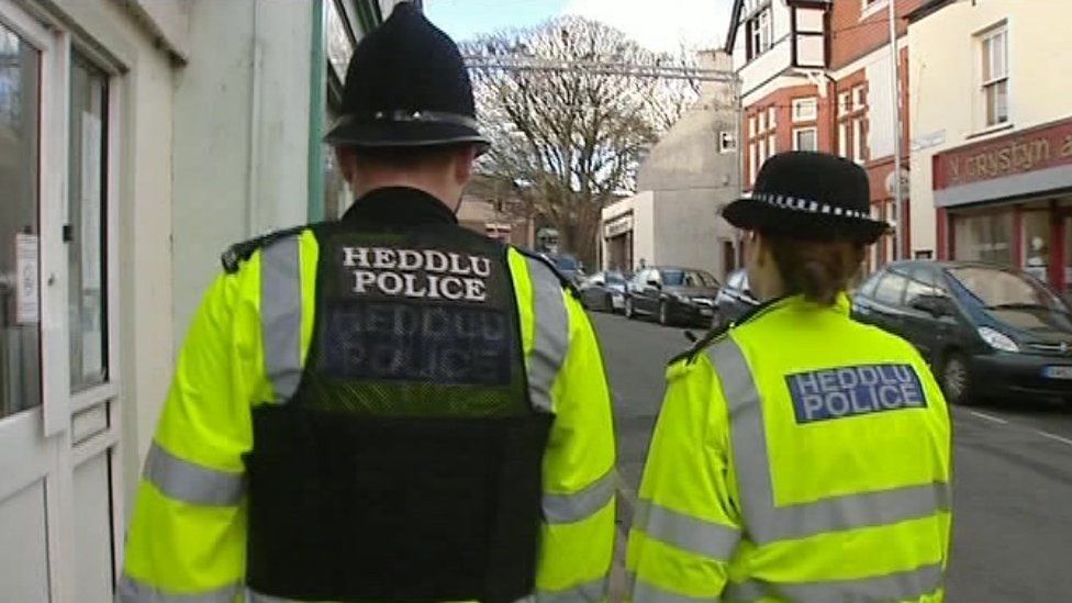 Police officers on a street in Wales